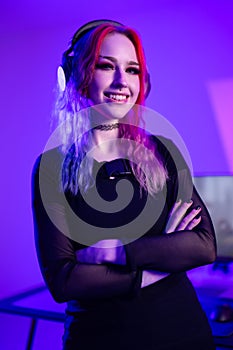 Focused Gamer Playing in a Vibrant Colorful Gaming Room