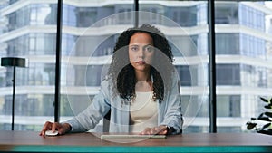 Focused girl moving virtual pieces sitting desk closeup. Woman typing keyboard