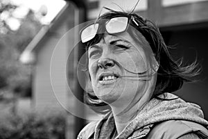 Focused girl piloting a quadrocopter.