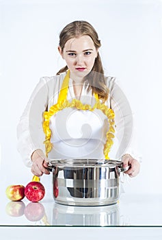 Focused homemaker in kitchen