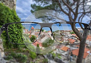 Focused image of view of the small town Omis surrounded with mountains, Cetina river and sea, Makarska Riviera, Croatia. Better