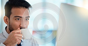 Focused lawyer sipping a cappuccino while working on a case for his upcoming legal trial. Closeup of the face and head