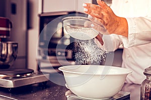 Focused photo on plastic bowl that standing on scales