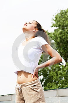 Focused runner outdoors resting