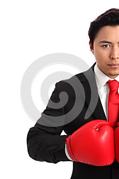 Focused staring businessman boxer