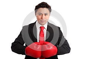 Focused staring businessman boxer