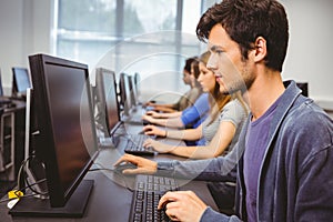 Focused student in computer class