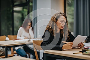 Focused students studying in a modern classroom environment