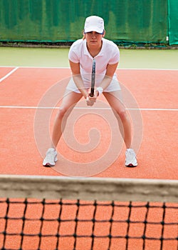 Focused tennis player ready for match