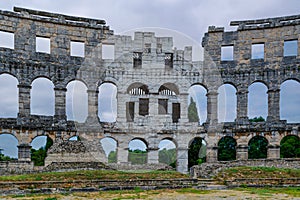 Focused view of the circular brickwork of Pula`s amphitheater
