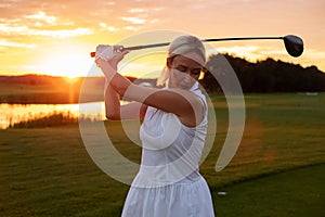 Focused Woman Get Ready to Hit Ball .