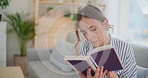 Focused Woman Reading Book