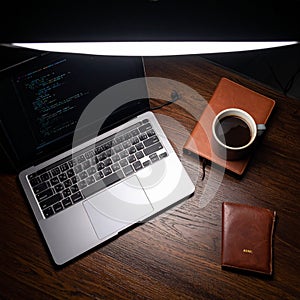 Focused Workspace at Night with Coffee