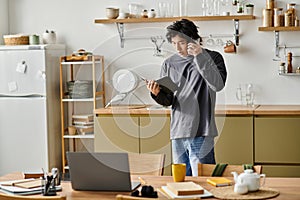 Focused young man engaged in e