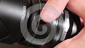 Focusing lens of digital camera. Camera lens zoom. Changing focal length. Close-up Camera Focus Focusing And Shooting