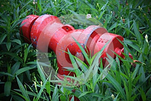 Focussed on the bright red fire hose