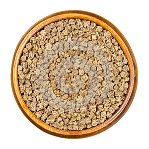 Fodder beet seeds, in wooden bowl photo