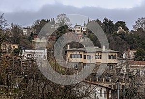 Fog above traditional houses in Milies village on mountain Pelion.Greece