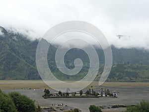 When the fog begins to descend at Pura Luhur poten at the foot of Mount Bromo