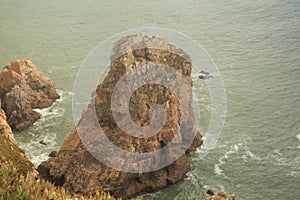 Fog. Cliffs of Cabo da Roca on the Atlantic Ocean in Sintra, Portugal, the westernmost point on the continent of Europe