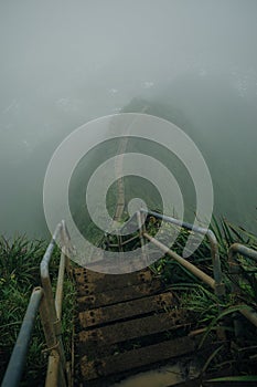 Fog covering Stairway to Heaven in Oahu island Hawaii