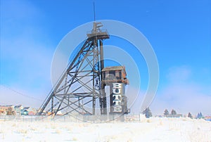 A fog filled Butte Montana Mining derrick photo