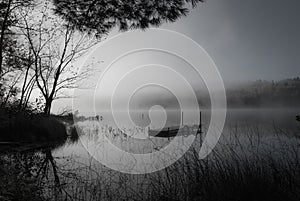 Fog on the lake in black and white.