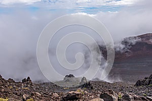 Fog lingers in crater of Haleakala Volcano, Maui, Hawaii, USA