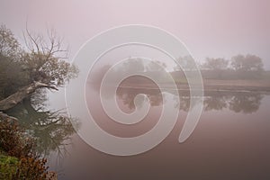 Fog and mist on a wild river