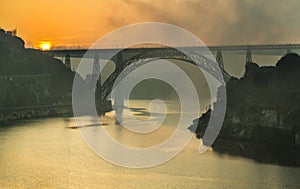 Fog over the Arrabida Bridge, Porto, Portugal photo