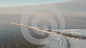 Fog over calm sea in cold winter day