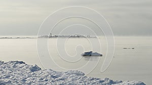 Fog over calm sea in cold winter day