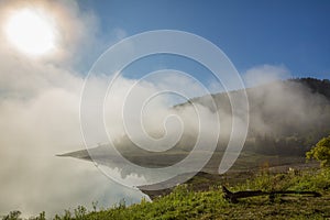 Fog over lake landscape of Zaovine lake on Tara mountain