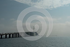 Fog over Sunshine Skyway Bridge on a December morning fog - 3 photo