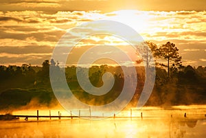 Fog over the water during sunrise