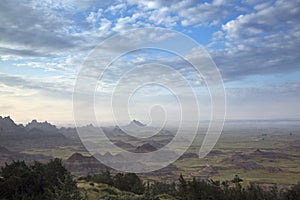 Fog Rises in the Early Morning at Cliff Shelf Nature Trail, Badlands, South Dakota