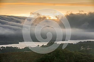 Fog Rolling over Crystal Springs Reservoir as seen from a vista point off Highway 280 on a Summer Sunset.