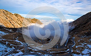 Fog in the valley in the Fagaras mountains on the Transfagarasan road