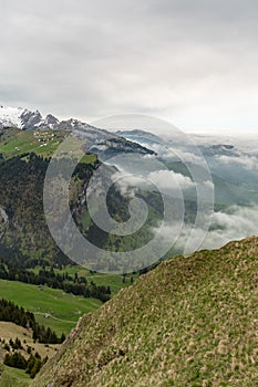 Foggy Appenzell area seen from the top of the mount hoher Kasten in Switzerland