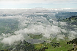 Foggy Appenzell area seen from the top of the mount hoher Kasten in Switzerland