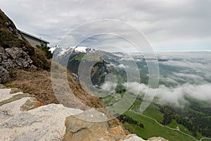 Foggy Appenzell area seen from the top of the mount hoher Kasten in Switzerland