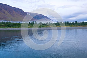 Foggy August morning on the Sob river. Polar Ural