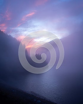 Foggy autumn morning at Sylvenstein reservoir in Bavaria