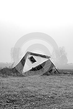 Foggy barn ruins