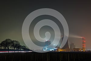 Foggy coal power station at night