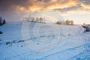 Foggy countryside at dawn. beautiful rural landscape in wintertime