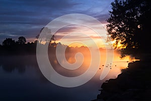 Foggy dawn skies over the billabong