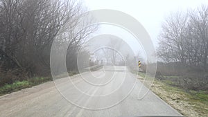 foggy day, driving on a rural road