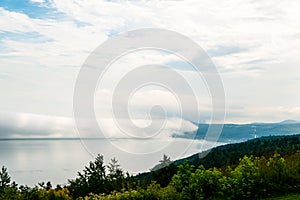 Foggy day by the St-Laurent river, golf fiel photo