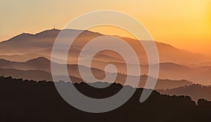 Foggy landscape of mountains layers. Misty mountains with fog